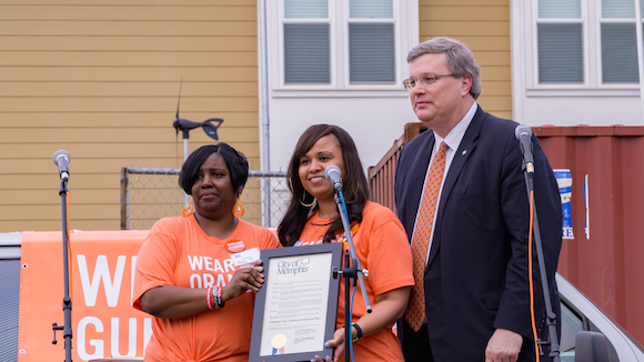  Mayor Strickland with Tara Johnson and Tara Thomas, holding the signed document declaring June 2 Gun Violence Awareness Day in Memphis