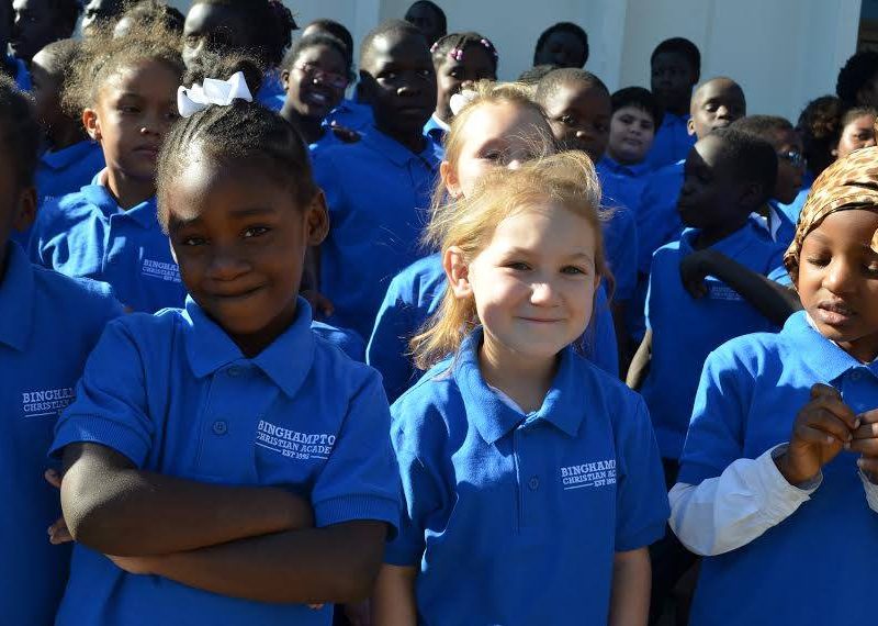 With each band shirt purchased by Bartlett High School, Agape North donated a uniform to students at Binghampton Christian Academy