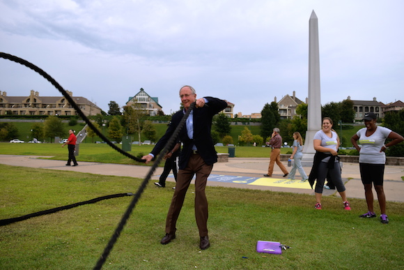 Henry Turley tries out the new battle ropes at the RiverFit Fitness Trail