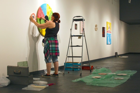 Mary Jo Kariminia installs her interactive art work