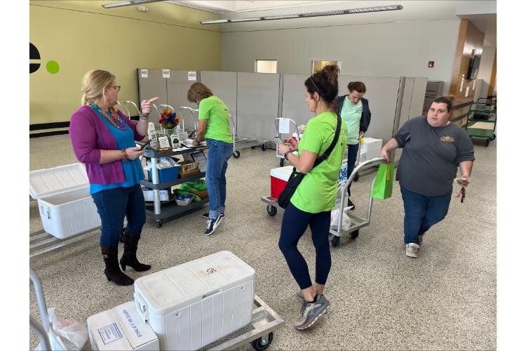 Volunteers and MIFA staff work together to get the food delivered to homes Monday through Wednesday and to 14 area congregate sites Monday through Friday.