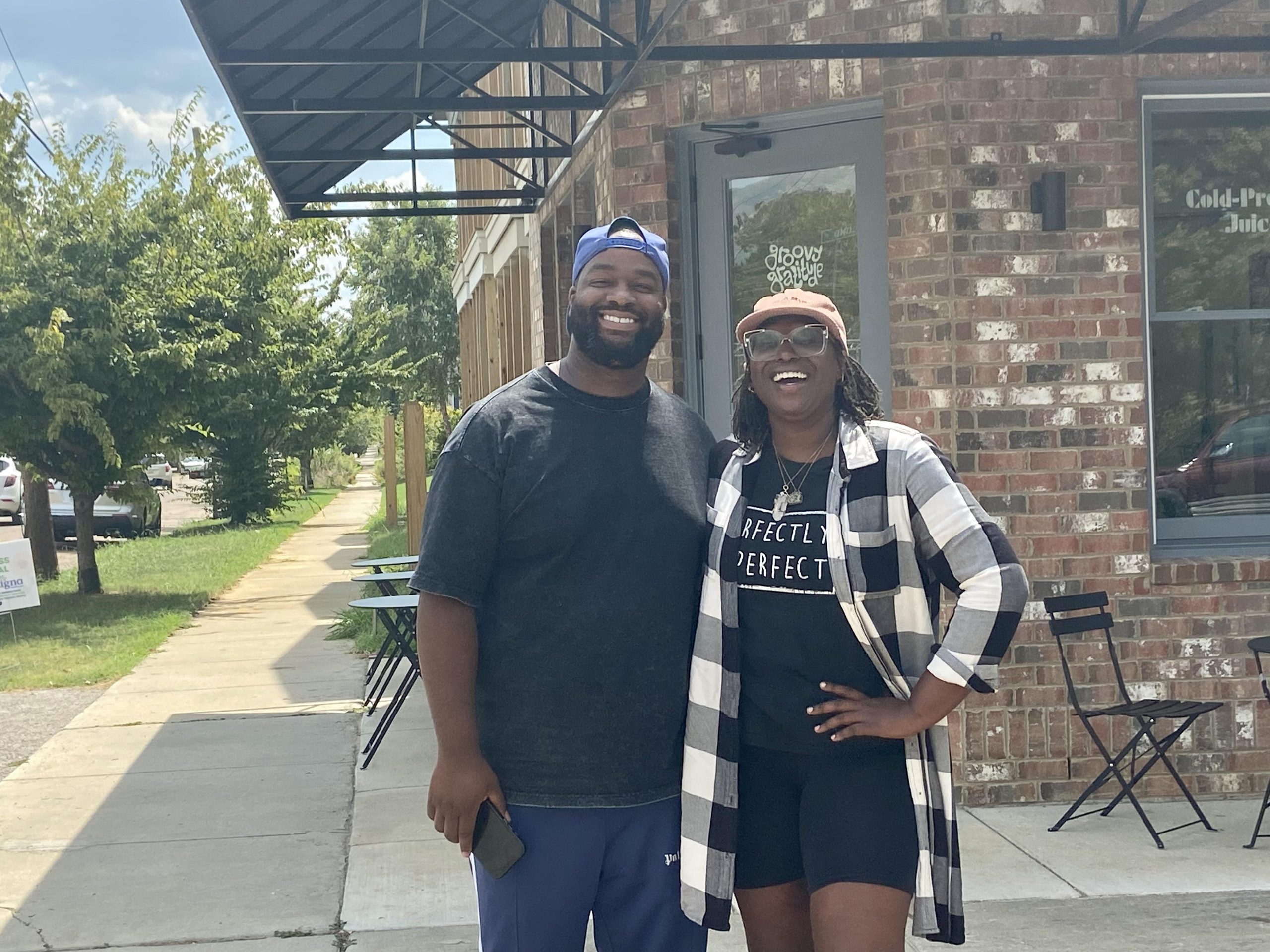 Marquis White and Alicia Dixon outside of Groovy Gratitude. (Photo taken by Danica Wilks)