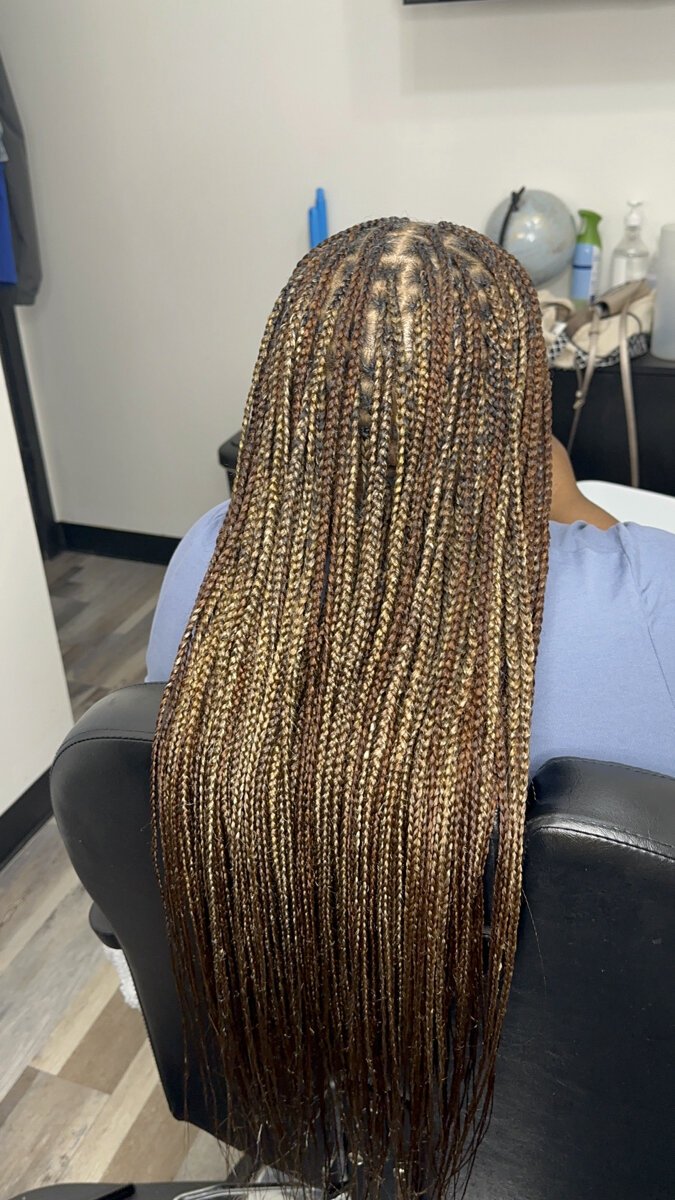 Another satisfied customer at FingersRite Hair Studio.