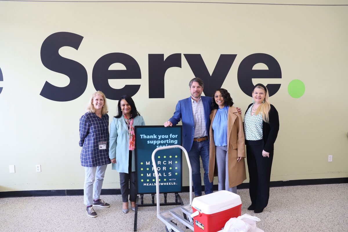 "The Meals on Wheels program is filling one of the gaps that our elderly population is facing," says Memphis City Council member Philip Spinosa, center. "You have senior citizens delivering meals to other seniors in their homes. It gives me goosebumps talking to you about it. I love knocking on people's doors and bringing hot food to them."