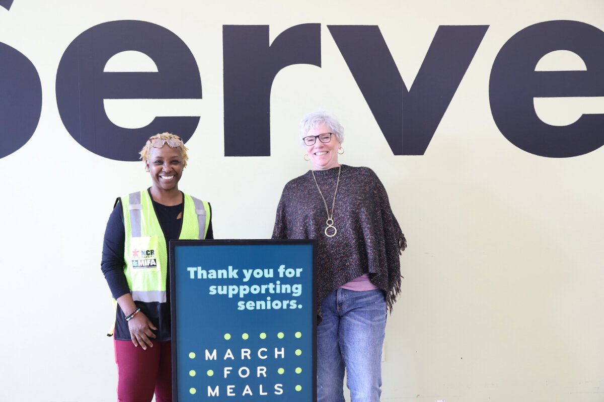 "Something near and dear to my heart is to work with the senior population and community," says volunteer Felicia Crayton-Lloyd, left. To her right is volunteer Jennifer Iverson, who says, "I love it and I love all the people."