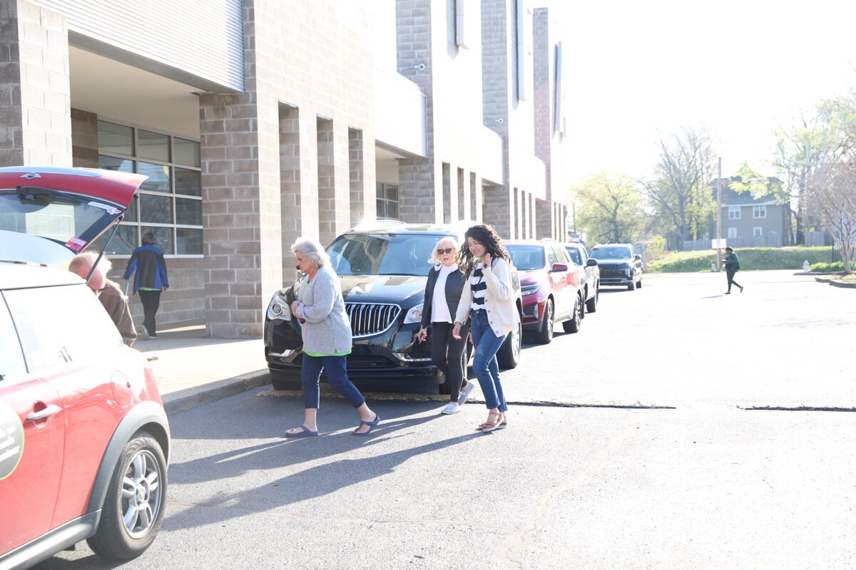 Rev. Dr. Peggy Jean Craig of the Cumberland Presbyterian Church
of Germantown, waving to the camera as she reports to volunteer: "Over and over again, (recipients) said, 'Bless you, you're such a blessing. God bless you. Have a wonderful day.' And then as I was driving out of one neighborhood, there was a house that had some graffiti written on it with the words John 3:16. I heard it as a reminder of love, that God so loves the whole world – every single neighborhood, every single corner of Memphis."