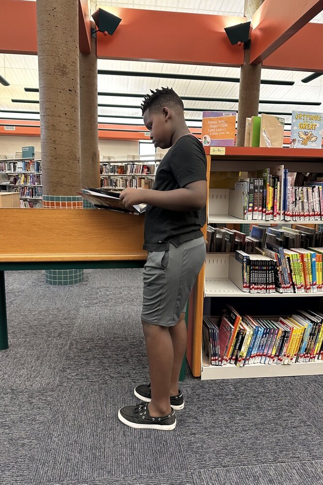 Tailor Jackson of Klondike enjoys the North Branch Library in Memphis.