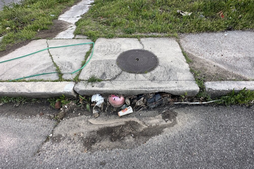 When it rains, the streets are flooded due to the clogged water drains.