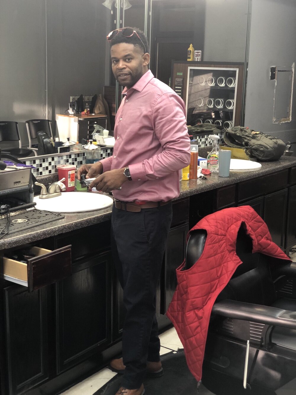 Jermaine Jackson, owner of Roots Barbershop.