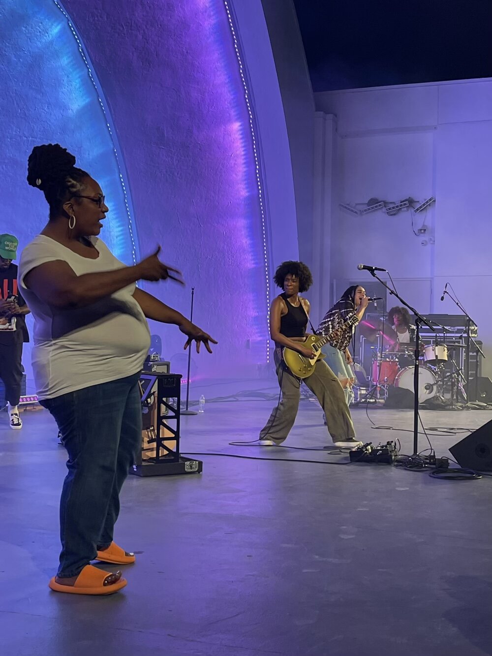 ASL interpretation of live music in action at the Overton Park Shell.