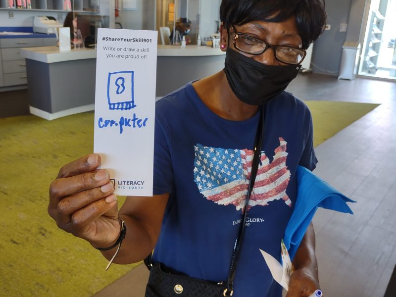 A #ShareYourSkill901 participant shows her written skill on a bookmark. (Photo courtesy of Literacy Mid-South)
