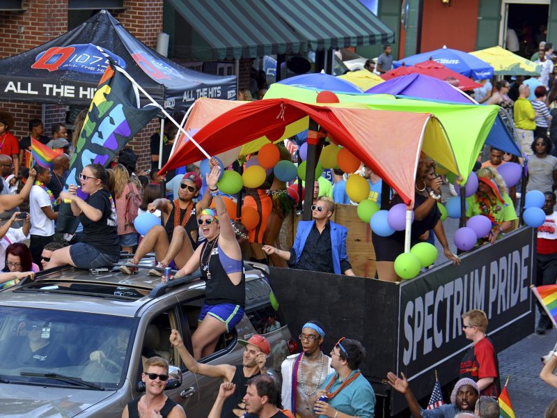 The street is filled with rainbows and parade participants at the 2016 Memphis Pride Parade. (photo courtesy of the Museum of Science & History/Pride Archives)