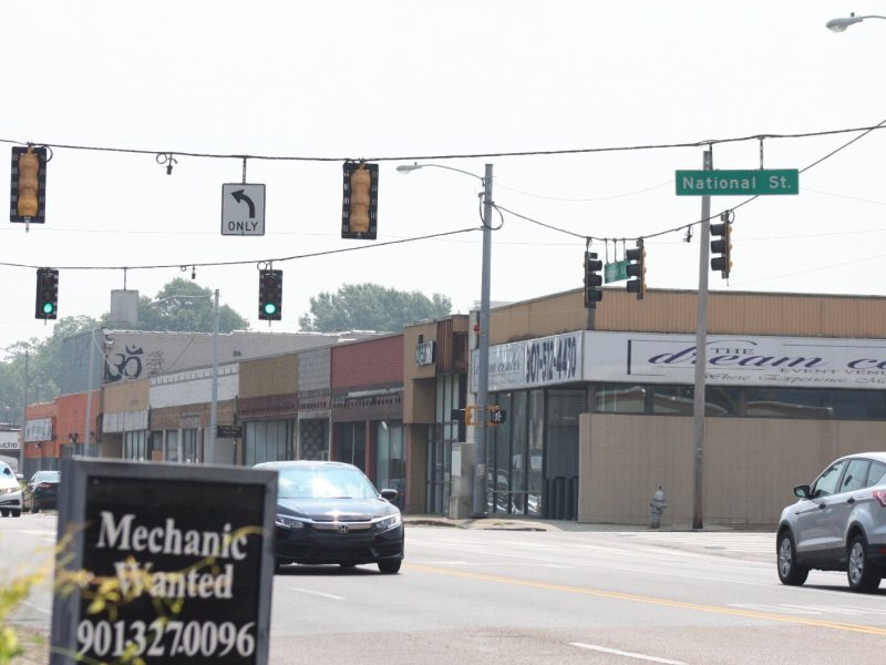 Drew Joyner and partners Octavius Nickson and Chris Hendrix of Nickson General Contractors purchased the 11-bay retail center at the southeast corner of Summer and National Street in May. They're now updating the exterior. (Cole Bradley)