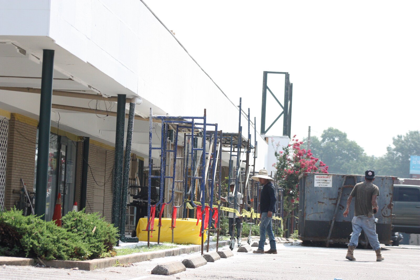 Facade improvements are underway at the 11-bay shopping centered on the southeast corner of Summer and National Street. (Cole Bradley)