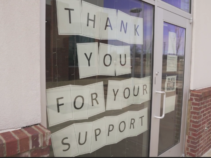 A sign on the windows of Inspire Community Cafe thanks passing customers driving on Sam Cooper Boulevard for their support. (Forever Ready Productions)