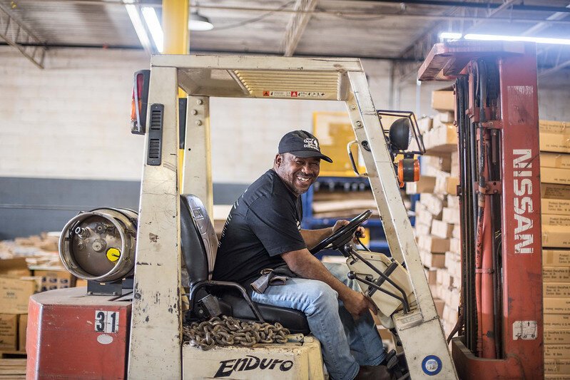 Donald Jenkins, an Advance Memphis client and former staffer poses on a forklift. The nonprofit offers a forklift safety certification that helps its clients get higher-paying jobs. (Advance Memphis)