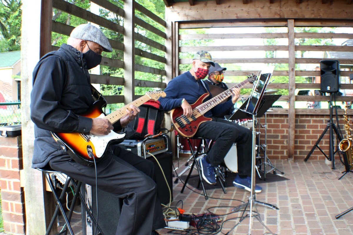 The Jazz Brothers played class jazz, blues, and rock tunes at the inaugural Green Leaf Earth Day celebration. The band includes a pianist/saxophonist  and vocalist who are not pictured. (Cole Bradley)
