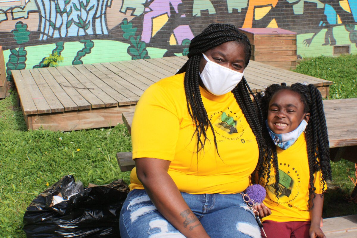 Domonique Phillips and her daughter, Ahmynni, attended the Green Leaf Learning Farm Earth Day event on April 22, 2021. (Cole Bradley)
