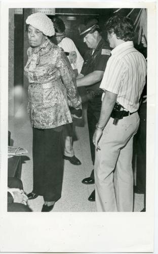 Cornelia Crenshaw is arrested for protesting at a Memphis City Council meeting in 1980. She was protesting the deaths of two members of her church who died in a severe heat wave. (Photo by Glenn Peterson)