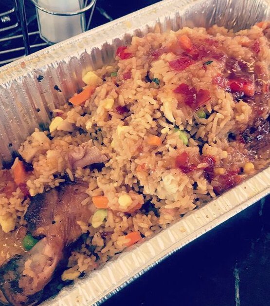 The Grille's stuffed turkey leg special includes a full smoked turkey leg flayed open and topped with a full order of fried rice. (Cole Bradley)