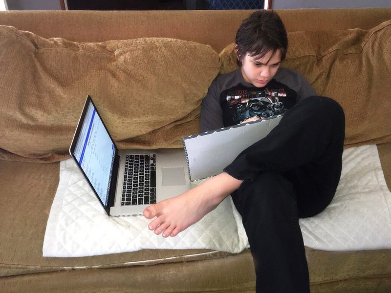 Hunter Coleman, 10, works on his homeschool math curriculum using a mix of online instruction and hands-on practice on a dry-erase board. A dry-erase board is a useful tool for practice work across subjects. (Jim Coleman).