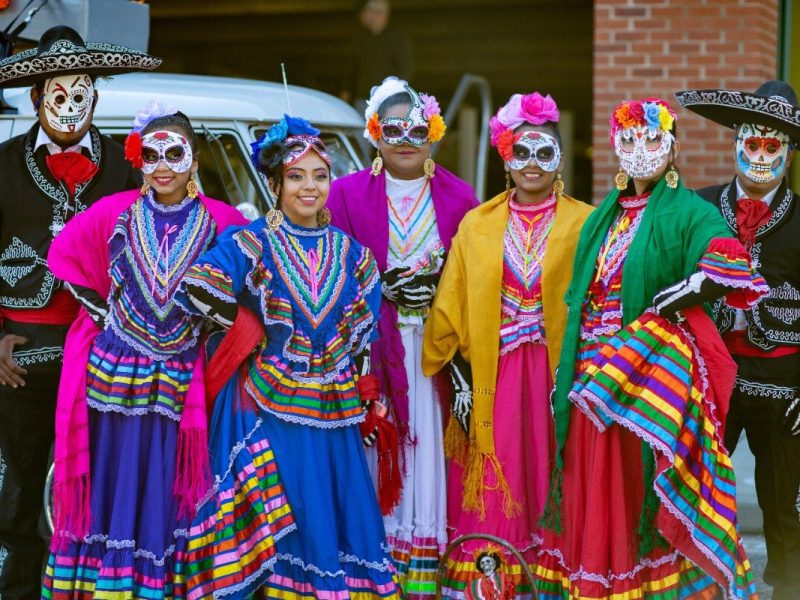 Members of Ballet Folklórico Herencia Hispana gathering before the parade in 2019 Dia de los Muertos parade. (Memphis Brooks Museum of Art)