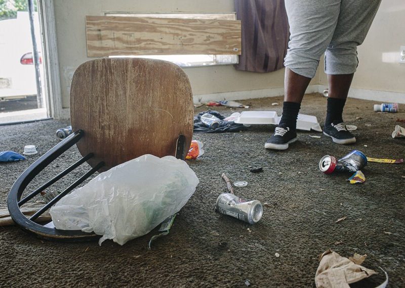 Kenzie Cleaves stands inside a vacant unit in her North Memphis apartment complex that she said has been unsecured for over a year. Unsafe housing conditions can increase COVID-19-related deaths. (Ziggy Mack)