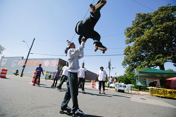 Roller skaters showcasing skills outside of the Stax Museum during the first annual Soulsville Music Festival, 2015. (Ziggy Mack)
