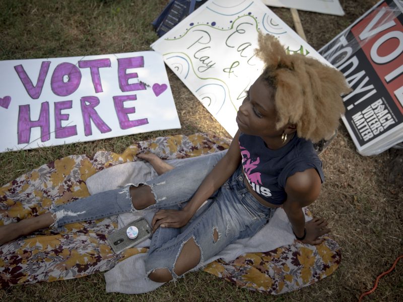 Alandria Ivory, a campaign worker for Memphis for All, takes a break during an early voting event at Glenview Community Center. (Andrea Morales)
