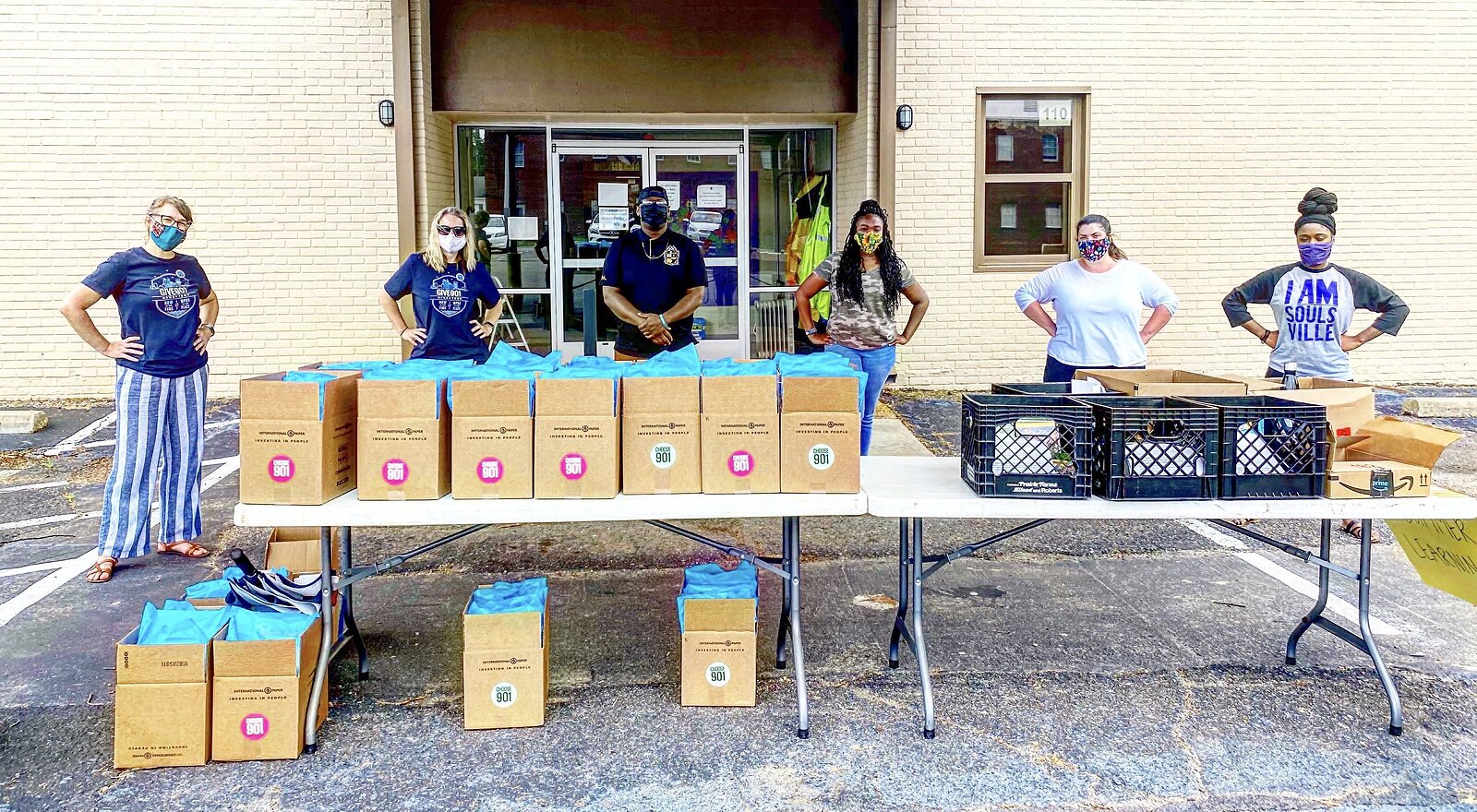 Team members and volunteers with Arise2Read distribute summer learning kits to kids who will have to battle the summer reading slide primarily from home this summer. (Submitted) 