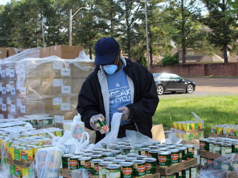A Neighborhood Christian Center volunteer preps meals for families in response to Covid-19. (Submitted)