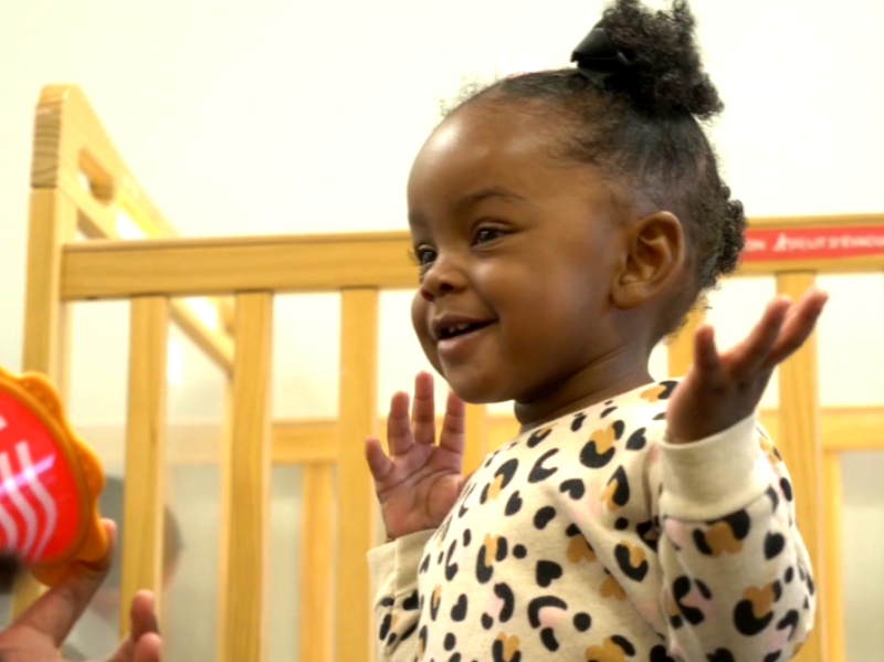 A toddler at the Porter-Leath Early Childhood Academy talks with her teacher. She's part of LENA Grow, which trains early childhood educators to build their students' conversation skills as a way to improve long-term learning success. (Forever Ready)