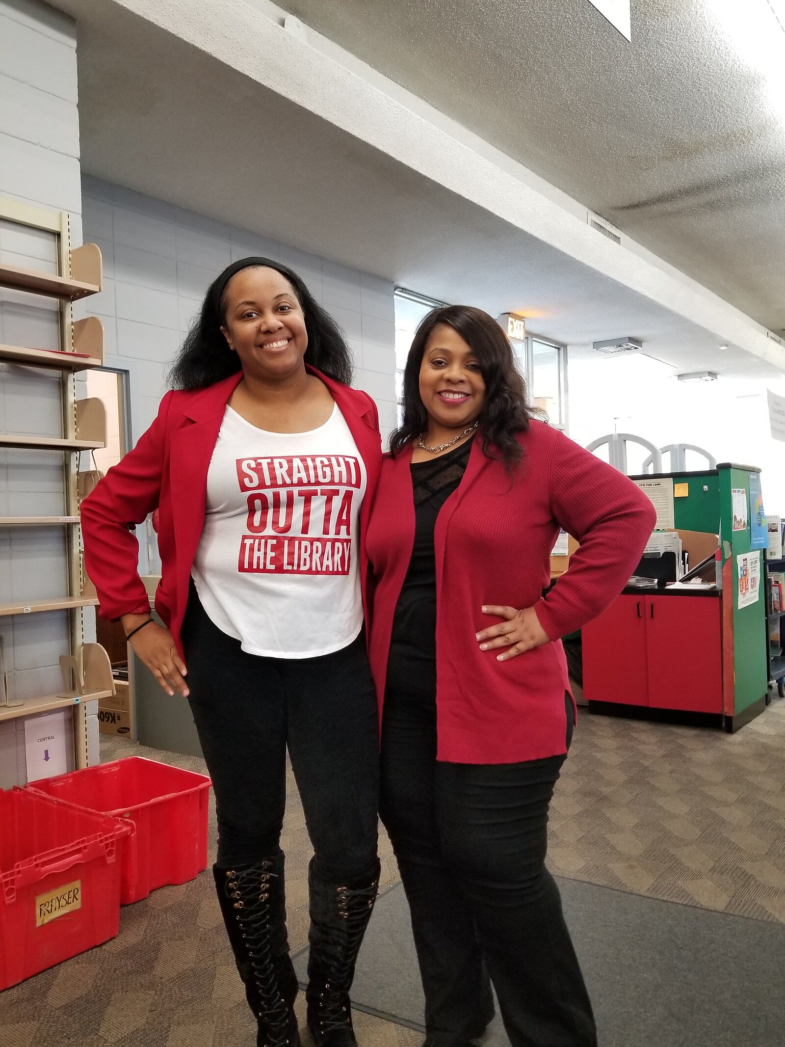 Frayser library staffers Nakia Armstrong (R) and Monique Rials on National Wear Red for Heart Disease day. The staff tied the importance of LifeBridge to heart disease awareness. Heart disease is the leading cause of death for women. (Monique Rials) 