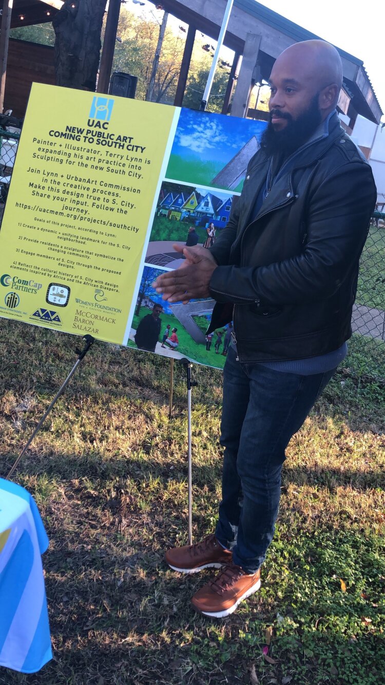Artist Terry Lynn listens to community members' suggestions and feedback to guide the design of his South City sculpture. (Symmbol Sanderlin)