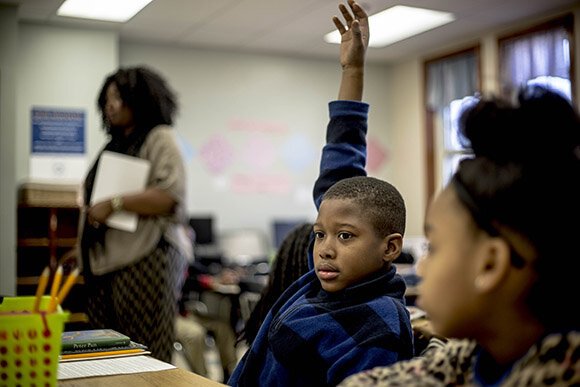Students in Monica Shaw's third grade class work on a lesson about Peter Pan at the Memphis Scholars Caldwell-Guthrie School. (Andrea Morales) 