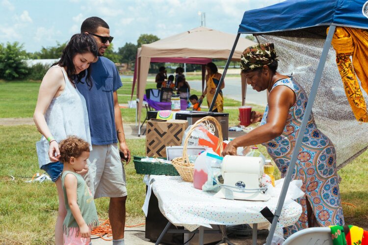 Customers check out a vendor's products at a vegan festival held in North Memphis. (Ziggy Mack) 