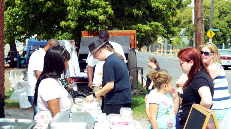Customers browse tables and shops at a South Memphis MEMShop event in 2014. (MEMShop)