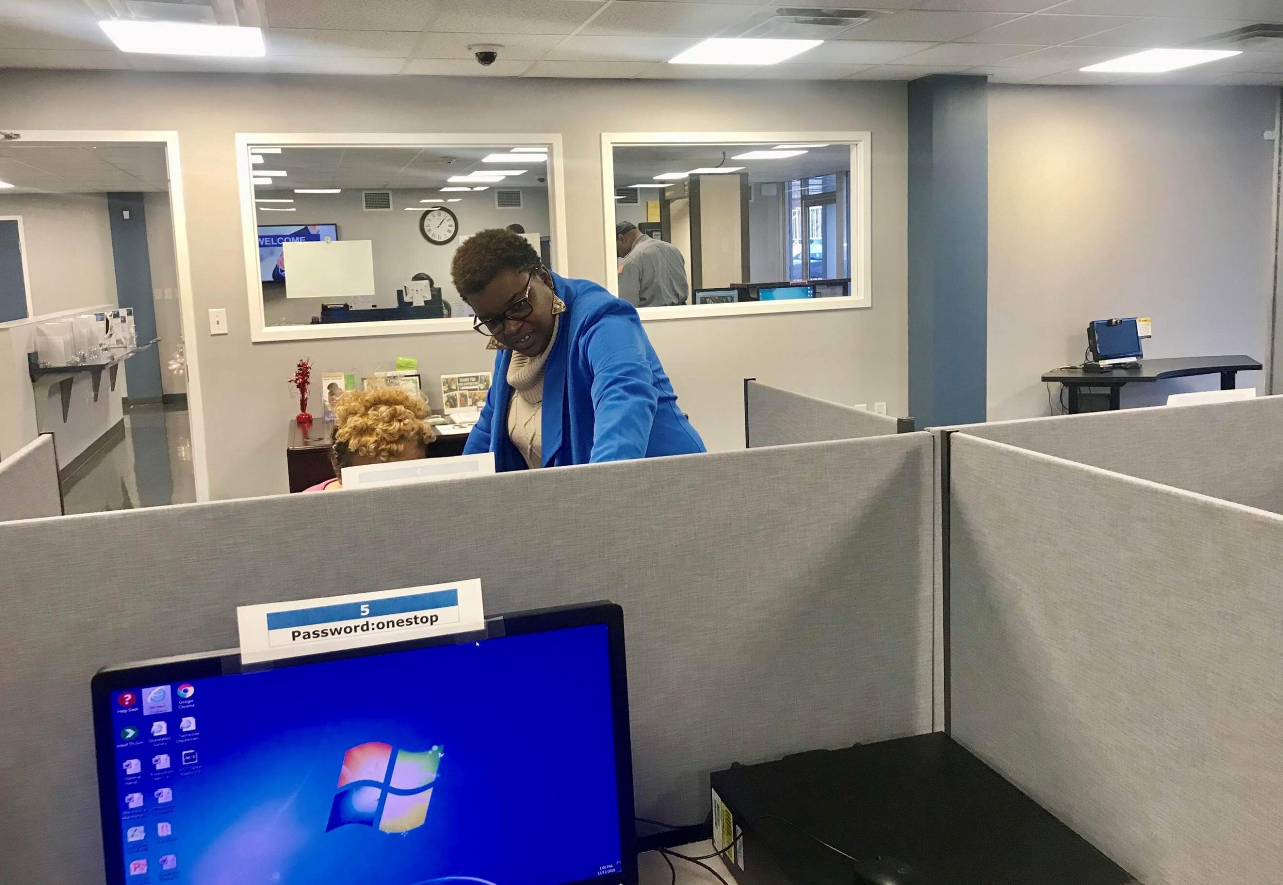Tameka D. Greer, project director for the Career Advantage Youth Program, assists a young person in an online job hunt. The program works with people ages 16 to 24 to identify and manifest their professional goals. (Felicia Christian)