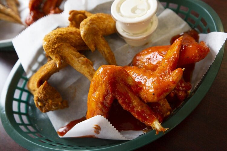 Mike's Wings & Such was the only one of the three locations to serve whole wings. While the tasters prefer party wings, they liked the smokey flavor of the whole wings. (Ziggy Mack)
