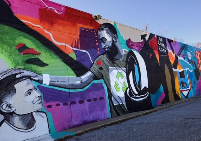 The Frayser Art and Environment mural by artist Jamond Bullock focuses on illegal dumping. It's located on the side of Superlo Foods on N. Watkins St. The side of the building is a frequent site of dumping, specifically discarded tires. (Cole Bradley)