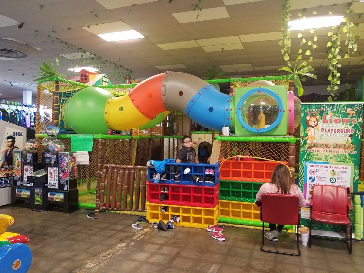 A child plays on the playground inside El Mercadito de Memphis. The market's restaurant and playground are managed by Juan Antonio Hernandez. (El Mercadito) 