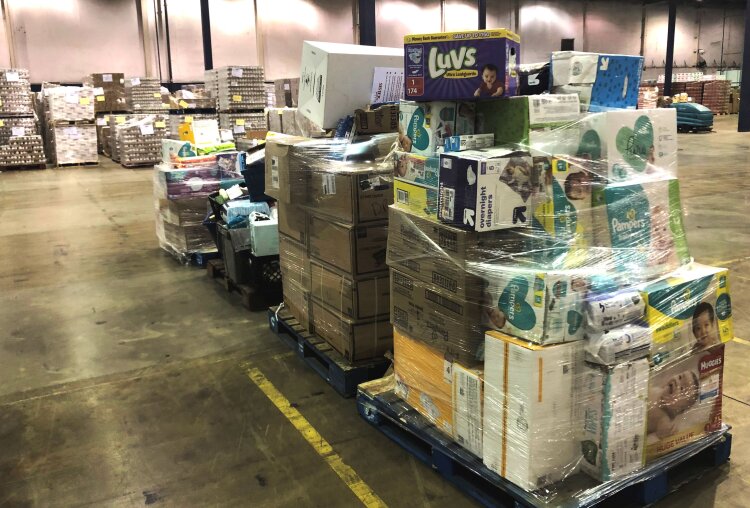 A pallet of diaper and period products sits in the Mid-South Food Bank's spacious new warehouse. The MSFB is housing and managing the Bare Needs Diaper Bank. (Mid-South Food Bank)