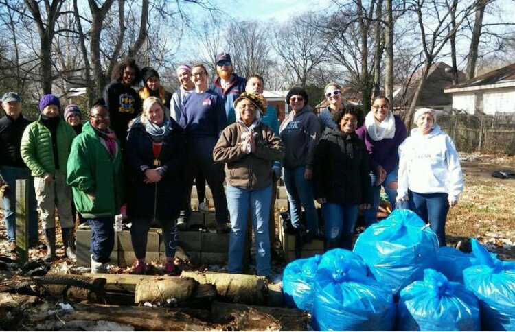 Volunteers pose after a community clean up event organized by the Klondike Smokey City CDC and supported by Hope City Church. (Submitted)