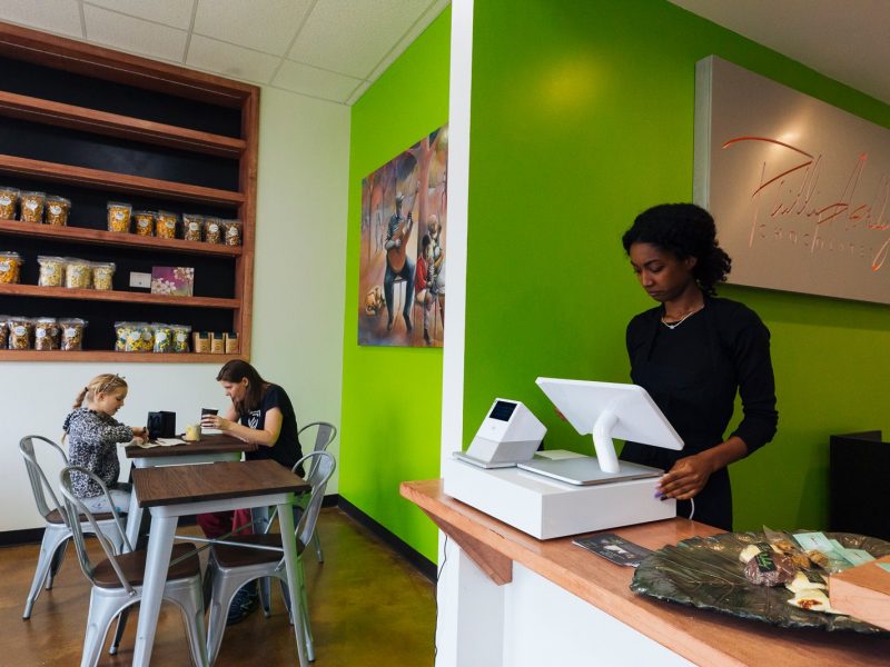 Joann Selvidge and her daughter, Frannie, enjoy their designer confections at Philip Ashley Chocolates cafe, located at 1200 Madison Avenue in Madison Heights District. (Ziggy Mack)