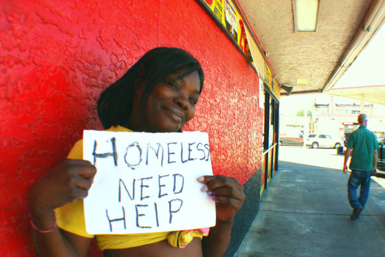 Shanreka Lovelady is pictured here at the Snappy Mart located at 1351 Madison Avenue. Lovelady is currently experiencing homelessness and frequents the area for its clustering of services, as well as her familiarity with the neighborhood. She previously lived on Court Street in Madison Heights. (Cole Bradley)