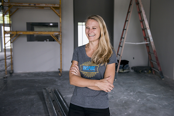 Kristin Fox-Trautman stands inside her restaurant, Inspire Community Cafe, which is under construction and is located next to her husband Lucas Trautman's Stardust Jiu-Jitsu studio. (Brandon Dill)