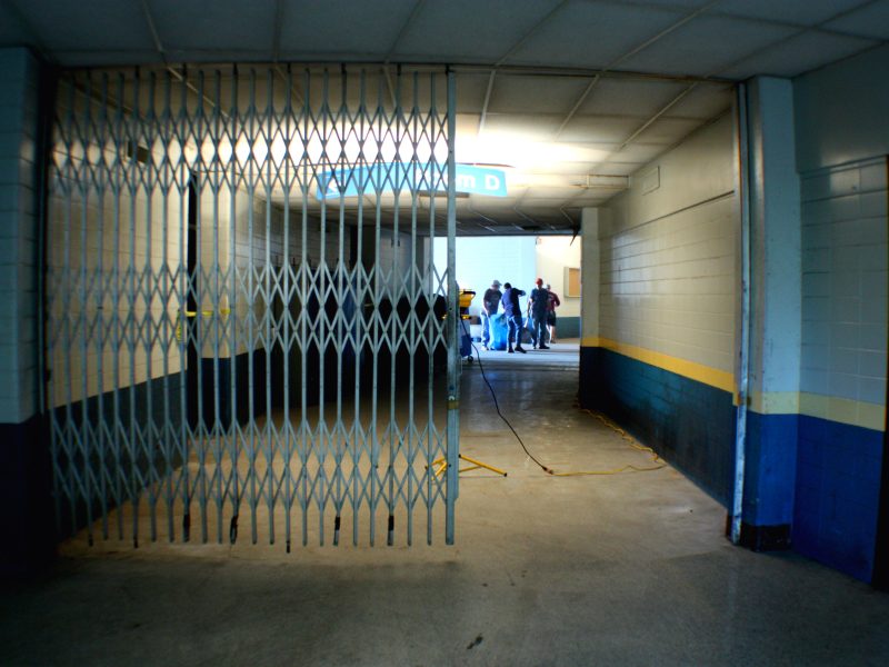 Volunteers work in the Coliseum's lower-level loading dock entrance. The building's arena and corridors were lit by task lighting provided by the City of Memphis. (Shelda Edwards)