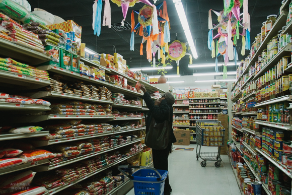 A shopper at Viet Hoa Food Market on Cleveland Street in the Madison Heights neighborhood. (Averell Mondie)
