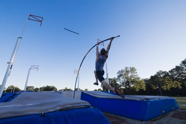 Pauls Pujats practices pole vaulting at the University of Memphis South Campus. (Ziggy Mack)