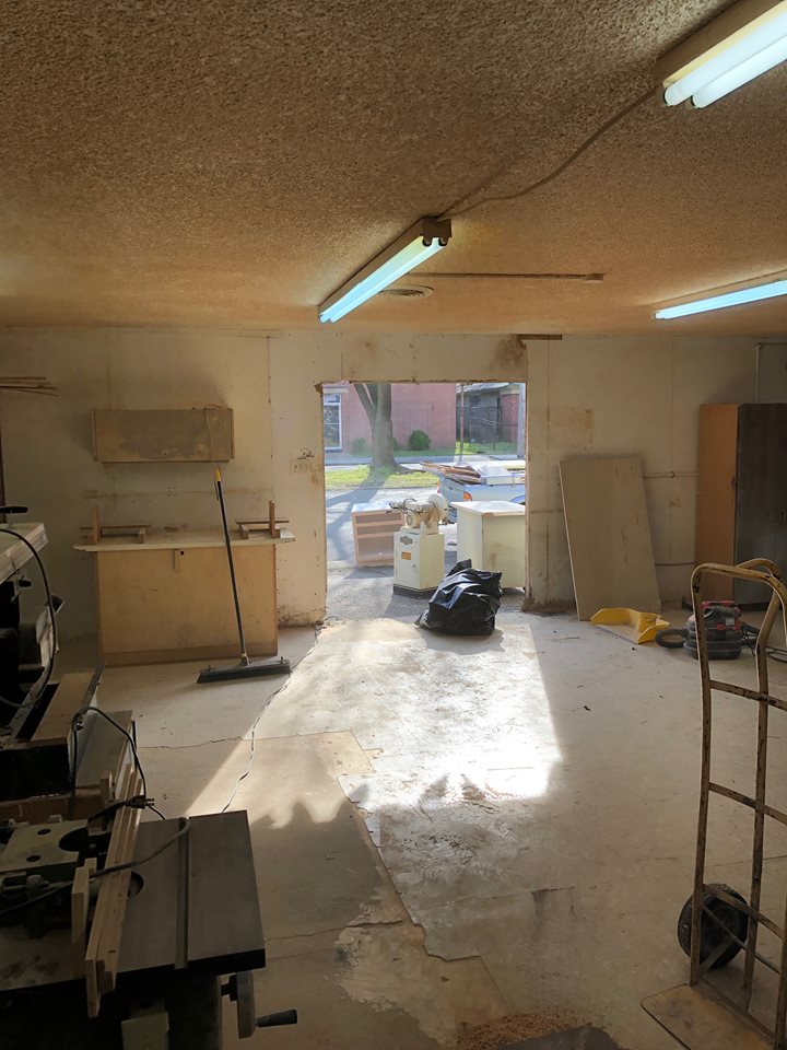 The Heights community recently installed an external door on the east side of the woodshop facing National Street. Previously, all of the street-facing windows to the woodshop were boarded up. (Scarlet Ponder)